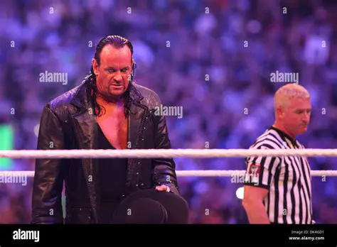 The Unforgettable Clash: Undertaker vs. Triple H No Holds Barred at WrestleMania XXVII